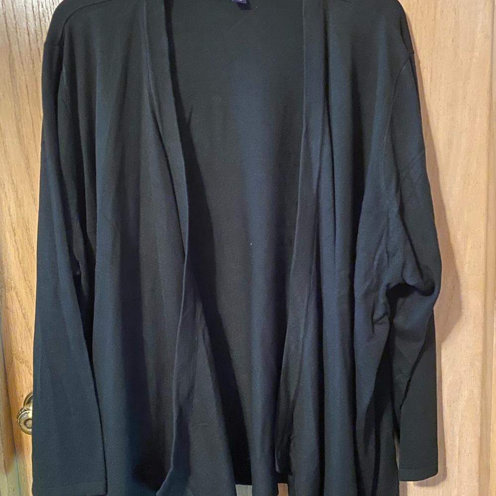 Black long sleeve never worn size is 4x but It was to big on me.